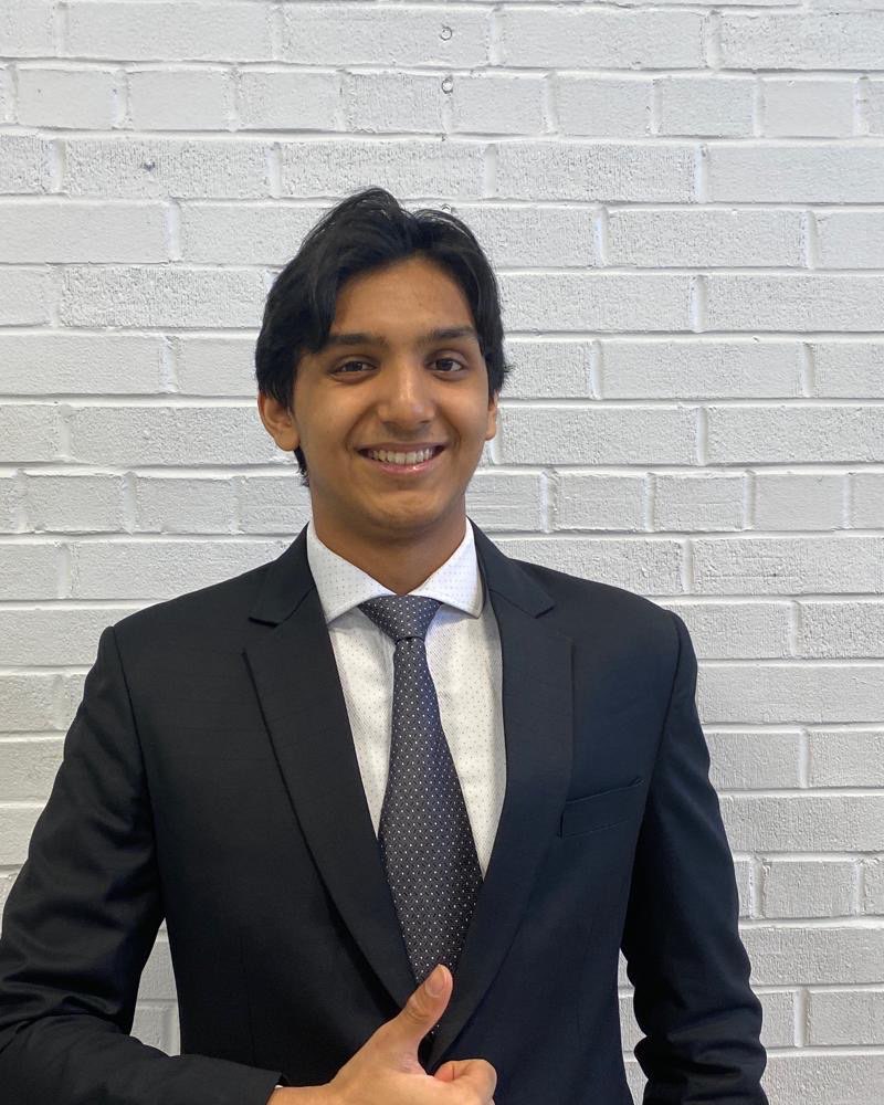 Aromal Mihraj, Brampton-based private tutor, in a navy suit